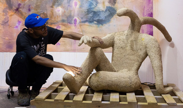 Hashel Al Lamki creates sculptures from circular materials, utilising leftover sawdust from making wooden frames.